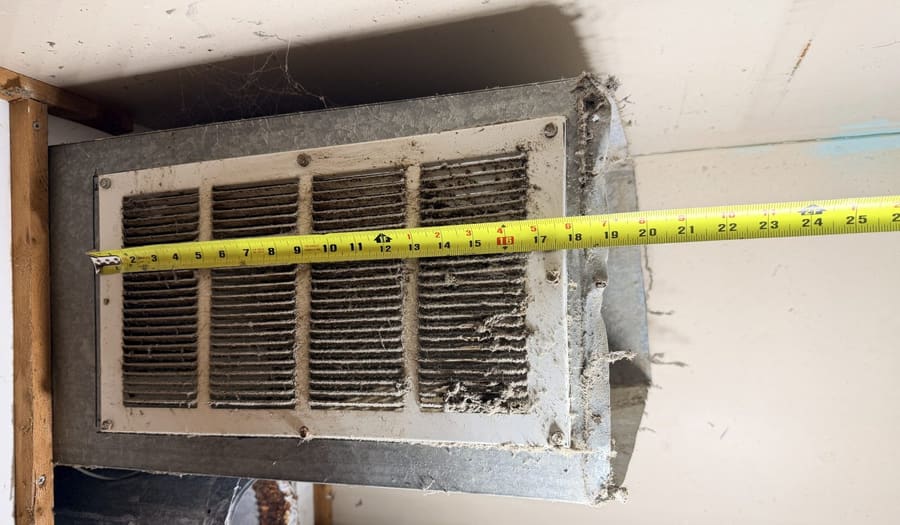 Dirty HVAC return grille with visible dust buildup during HVAC inspection in South Jersey home