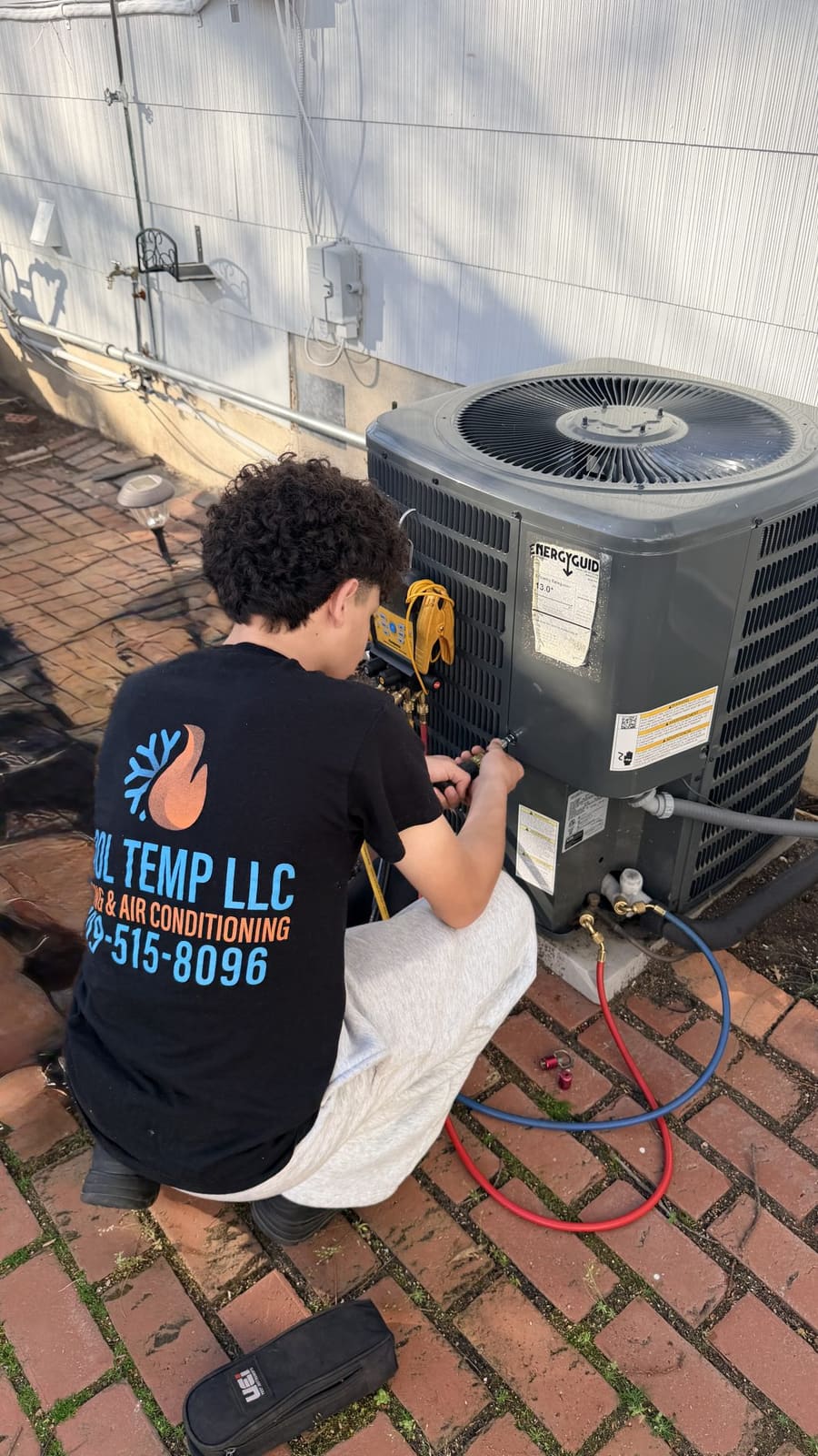 Cool Temp technician Anthony diagnosing an air conditioner freezing up during an AC service call in South Jersey.